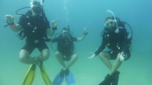 Stef Seb and Simone doing scuba yoga