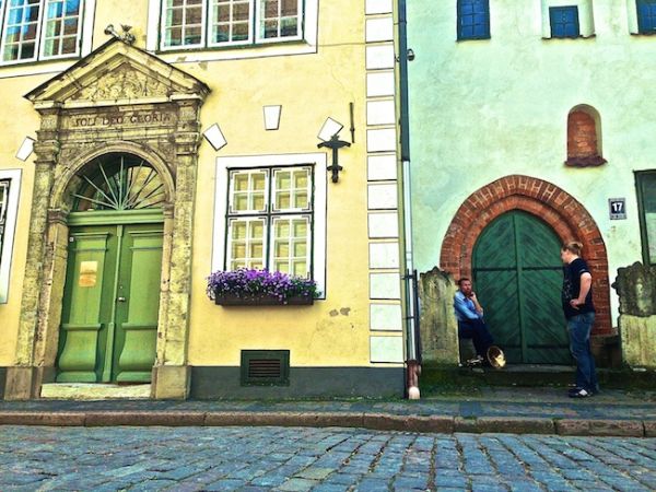 Tuba busker taking a break in Riga's Old Town